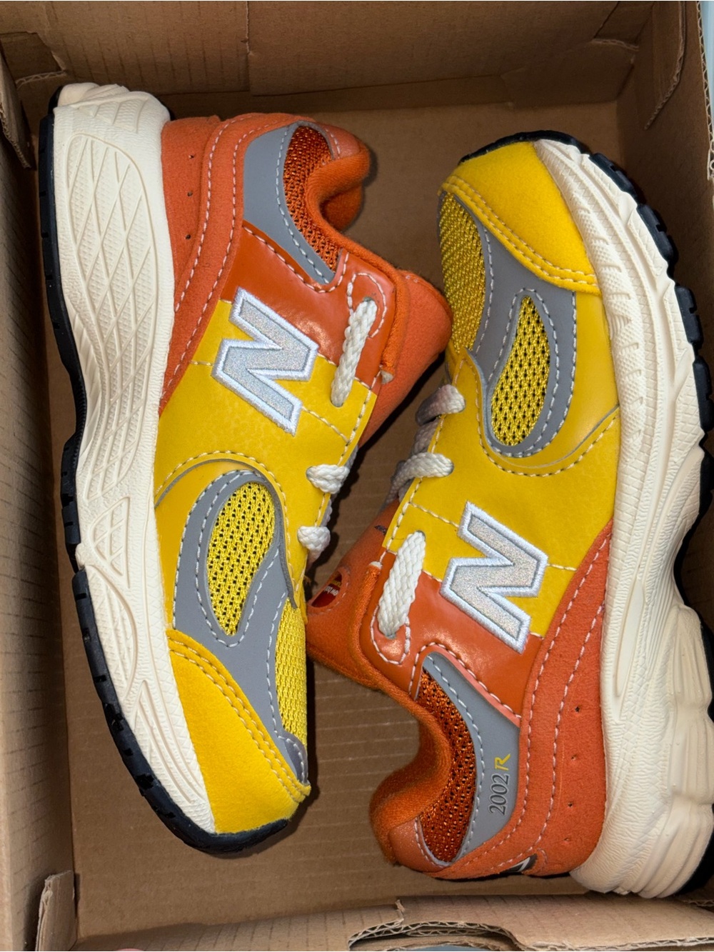 New Balance Kids Orange and Yellow 2002R Sneakers